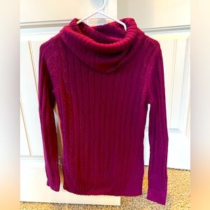 Woman’s purple turtleneck sweater New York & Co